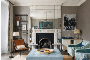 Decorative mirror panels installed above a fireplace in a classic living room
