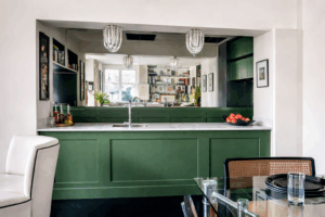 Mirror splashback installed behind a kitchen sideboard and sink area