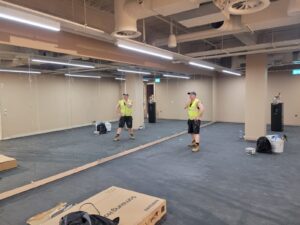 Commercial mirrored wall installation gym interior